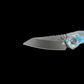 Millit Overland - Blue / Black Carbon Fiber - Black Collar & Backspacer - MagnaCut Black Cerakote Blade