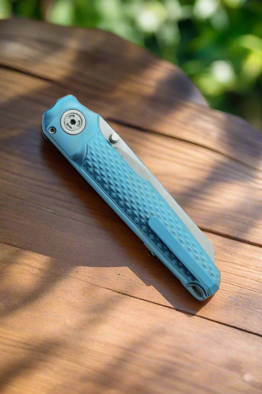 MKM LionSteel Simone Tonolli Miura Button Lock Folding Knife 2.72" M390 Satin Reverse Tanto Blade, Blue 3D Machined Integral Titanium Handles - MK MI-TBL