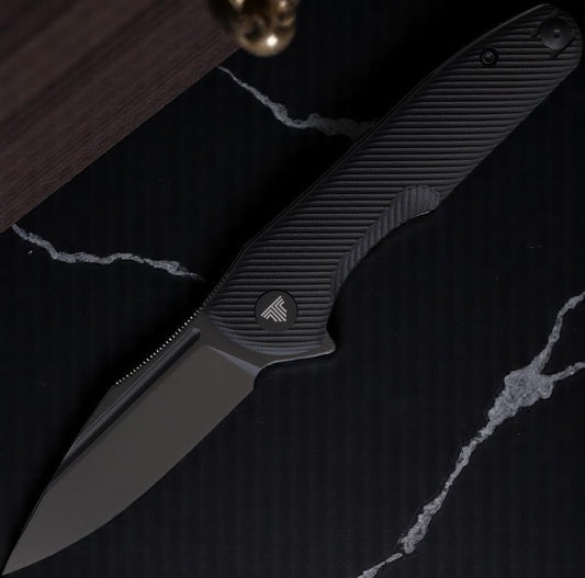 Trivisa Antliae-03B Liner Lock Folding Knife 3.26" 14C28N Steel Black G10 Handle